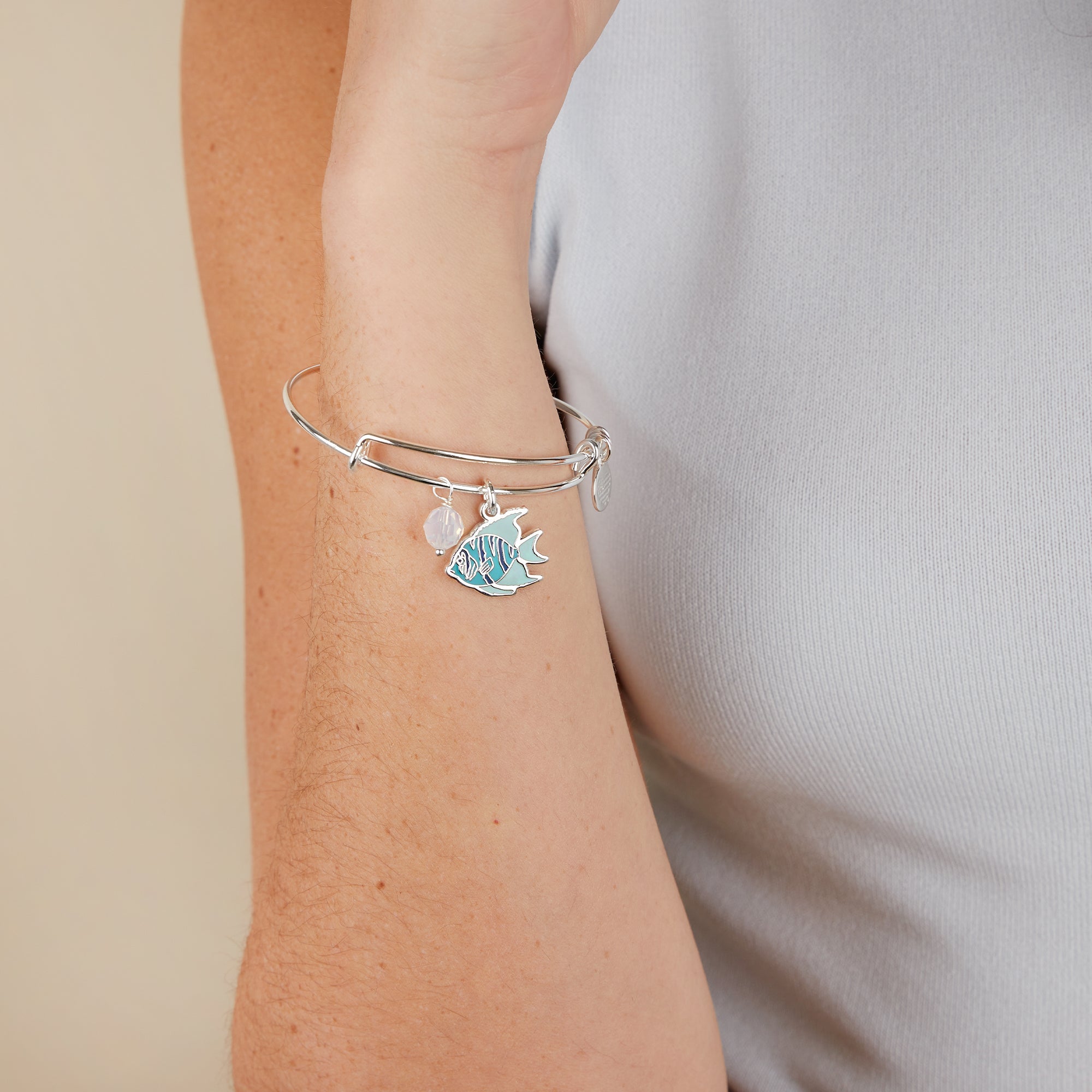 Tropical-Fish-Duo-Charm-Bangle-Silver-Model-A21EBTSDSS.jpg
