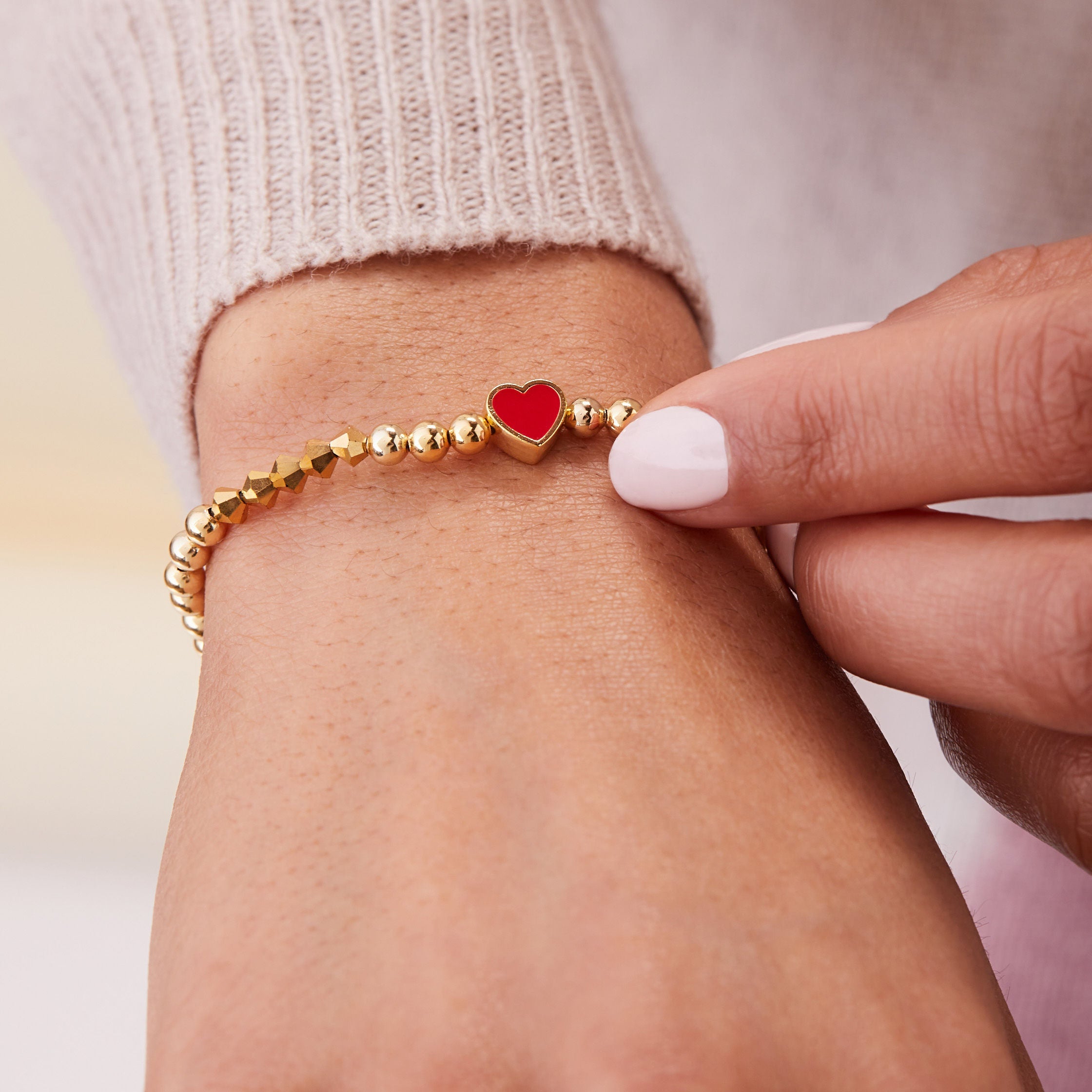 heart-beaded-stretch-bracelet-red-model-A22STHRT2SG.jpg