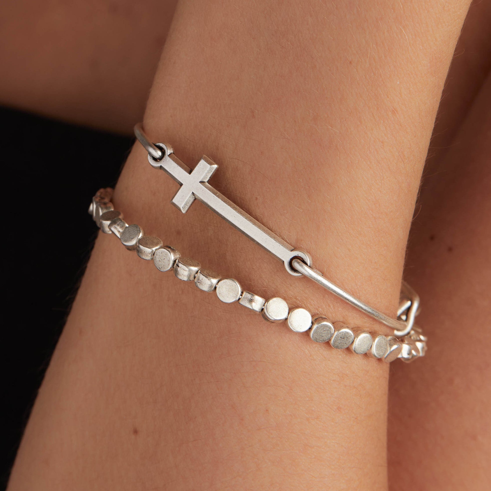 spiritual-armor-cross-inline-charm-bangle-on-model-AA692122RS.jpg